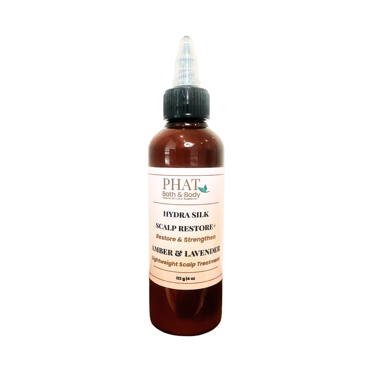 A amber bottle of PHAT Bath & Body Scalp Restore+ hair treatment with a black dropper cap and a cream-colored label, set against a plain white background.