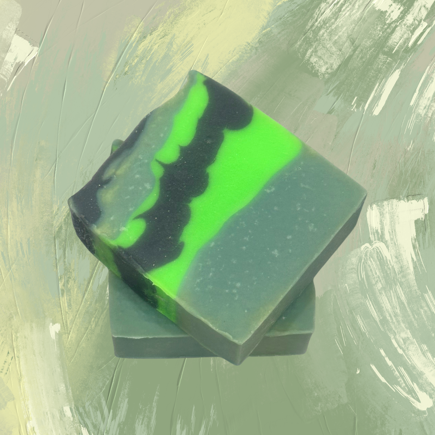 Green and black striped soap bar on a textured green background