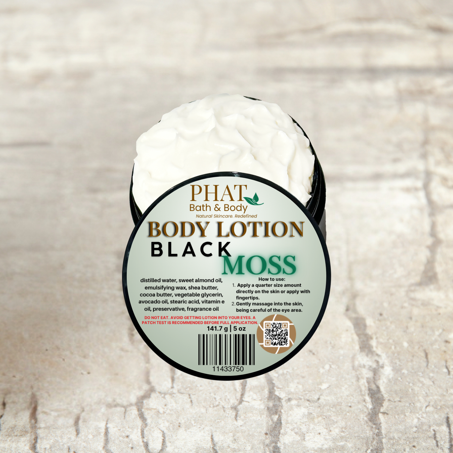 Body lotion bar with 'Phat Bath & Body' label on a textured beige background