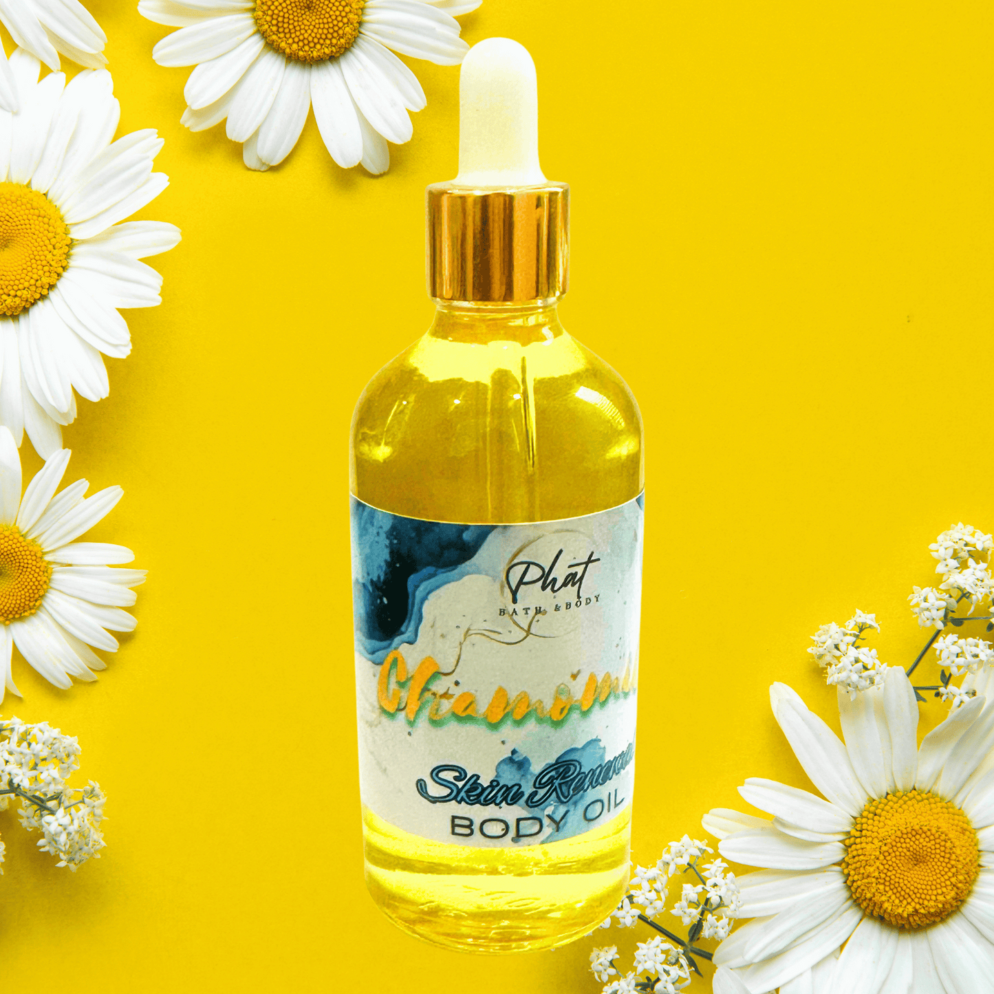 Body oil bottle with a dropper surrounded by daisies on a yellow background