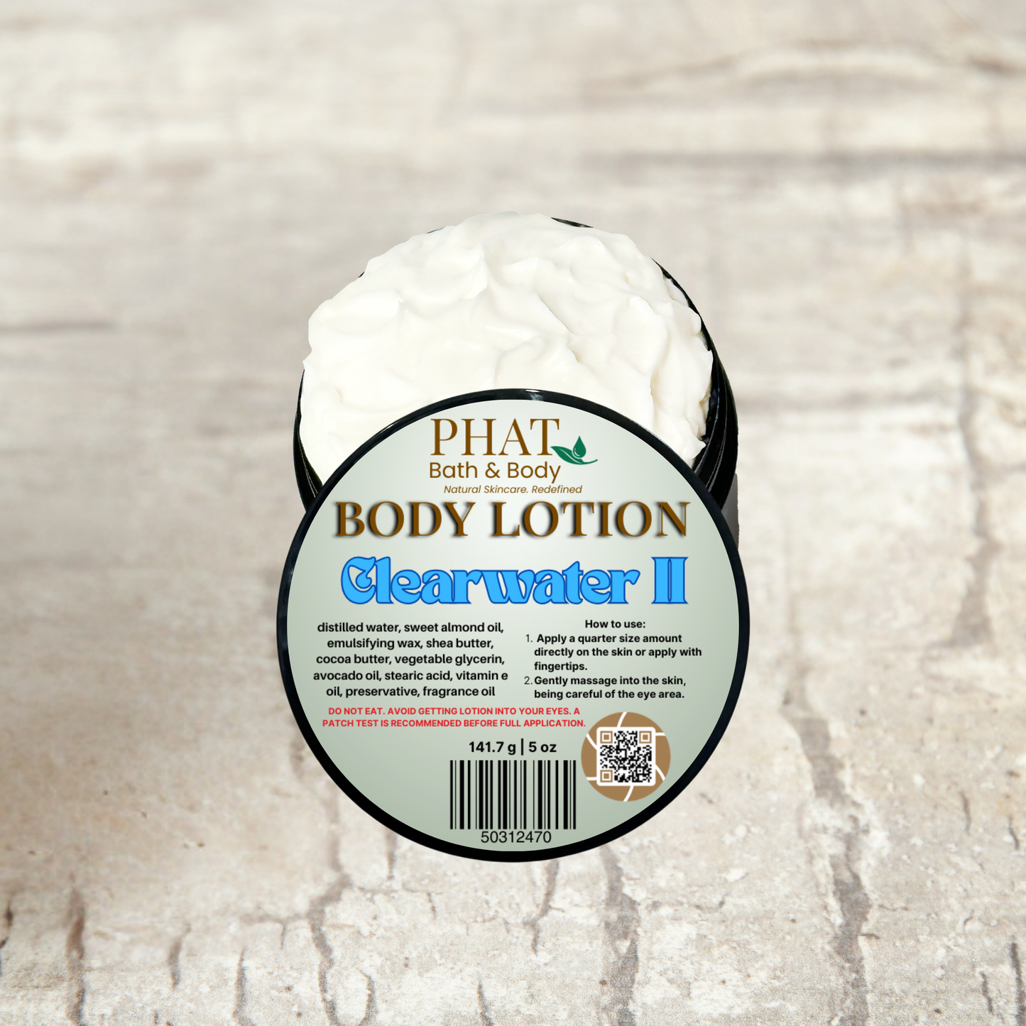 Body lotion container labeled 'Clearwater II' by Phat Bath & Body on a textured beige background