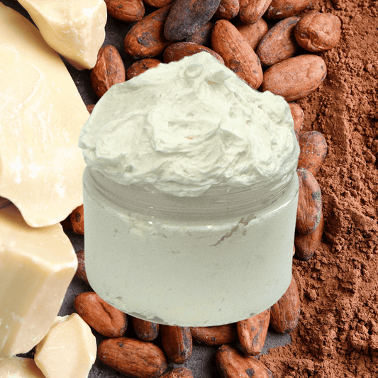Jar of body butter surrounded by cocoa beans and cocoa powder