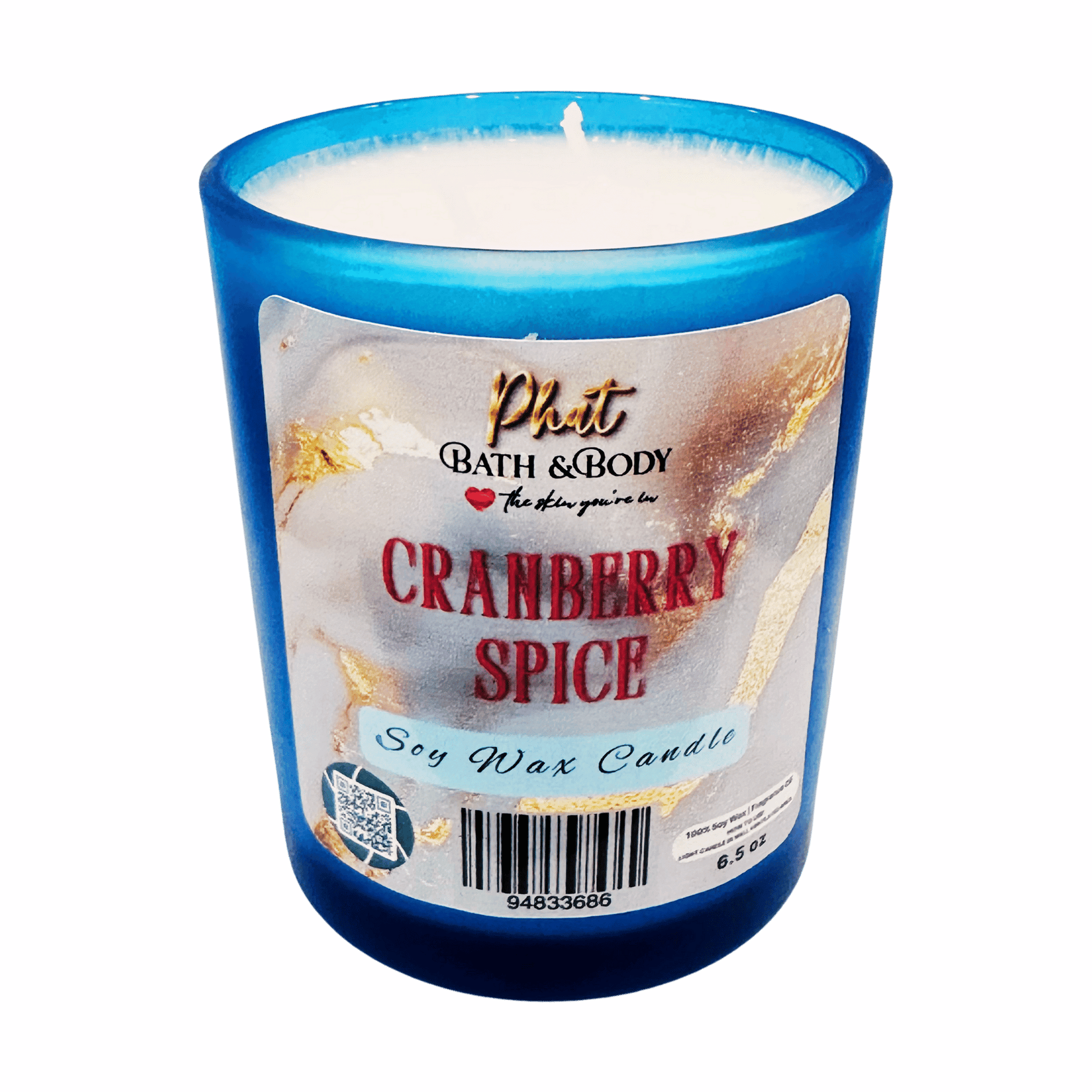 Candle with a 'Phat Bath & Body Cranberry Spice' label on a transparent background