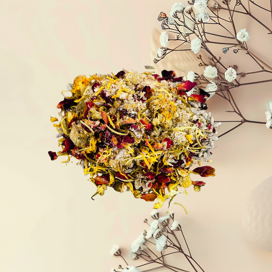 Heart-shaped arrangement of bath tea on a beige background