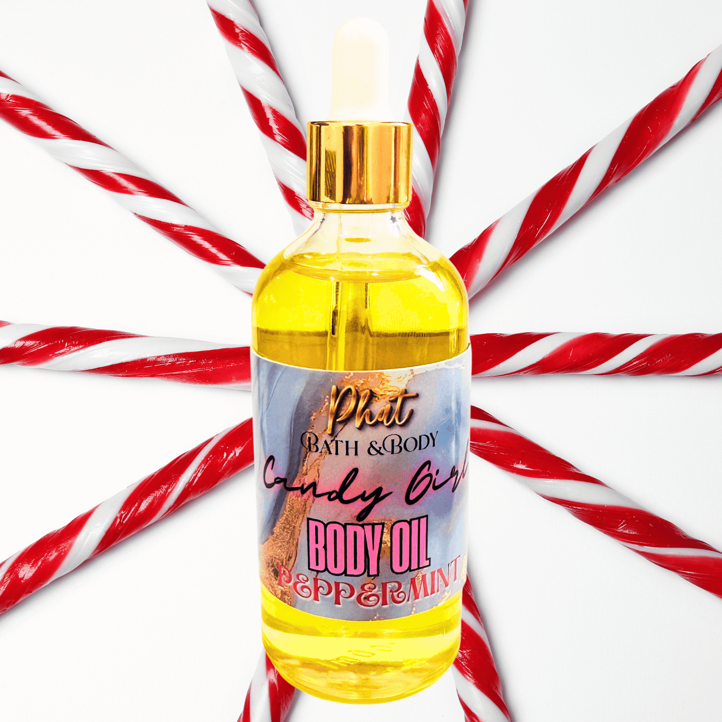 Body oil bottle with candy cane background