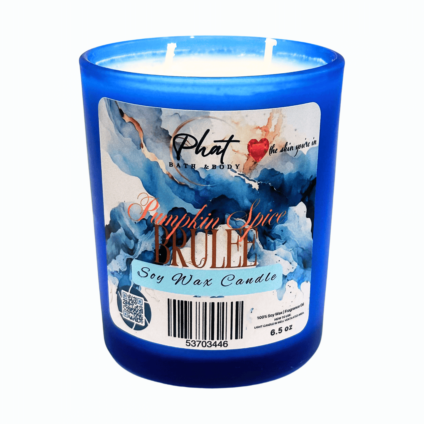 Blue candle with a decorative label on a white background