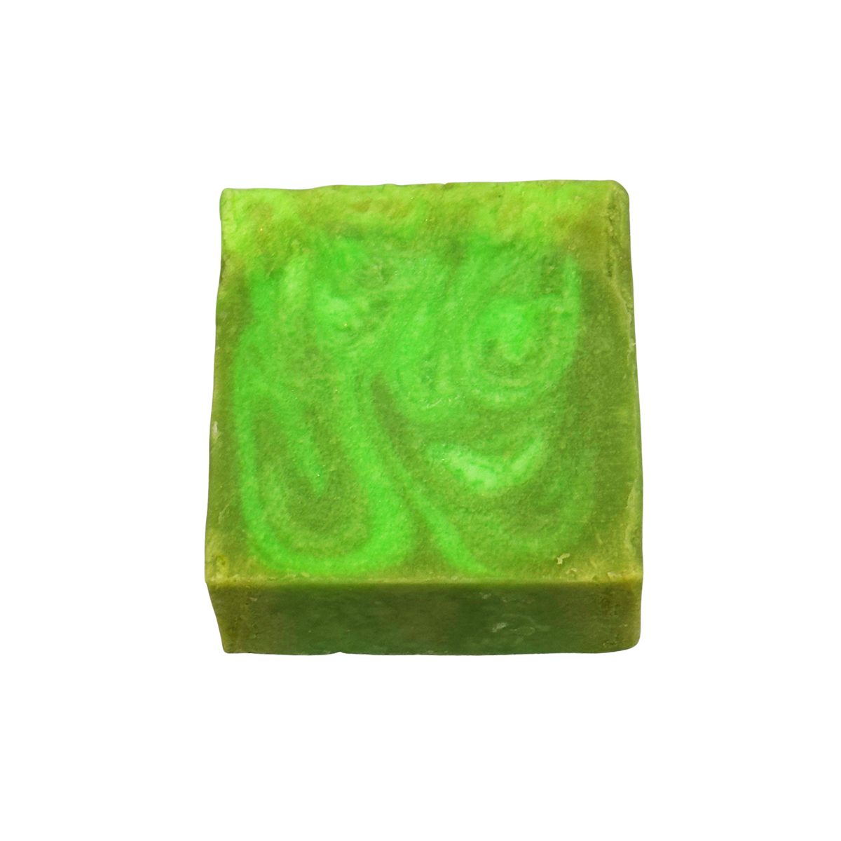 Green soap bar with swirl pattern on a white background