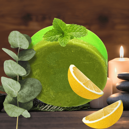 Green soap with lemon slices and eucalyptus leaves on a wooden background