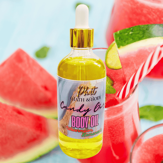 Bottle of body oil with watermelon slices and a drink in the background