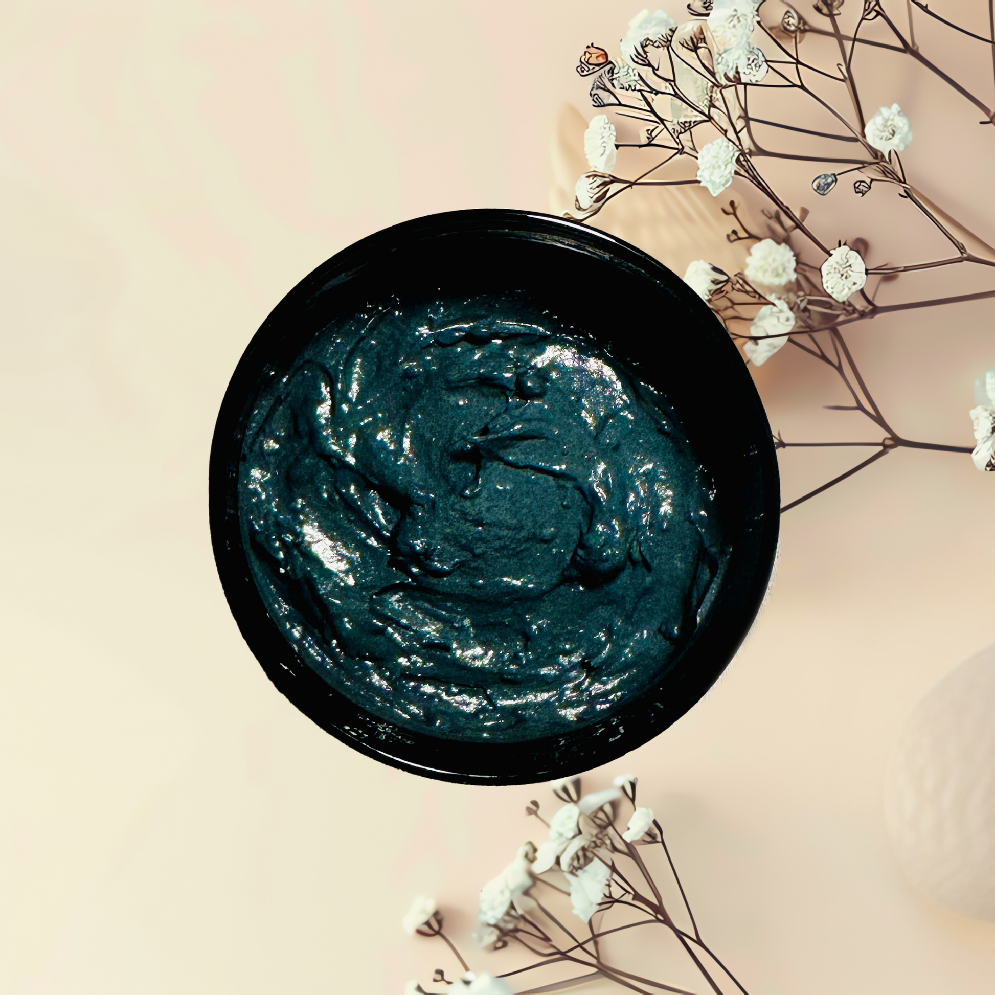 Black jar with black mask on a beige background with white flowers