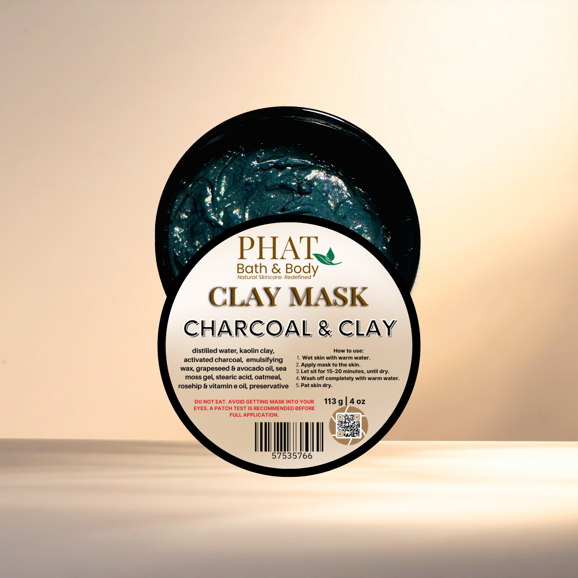 Clay mask container with 'Phat Bath & Body' branding on a beige background