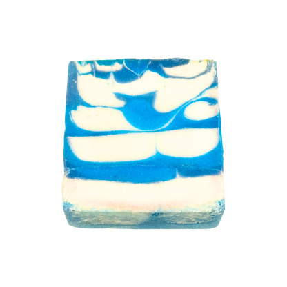 Bar of soap with blue and white swirl pattern on a white background