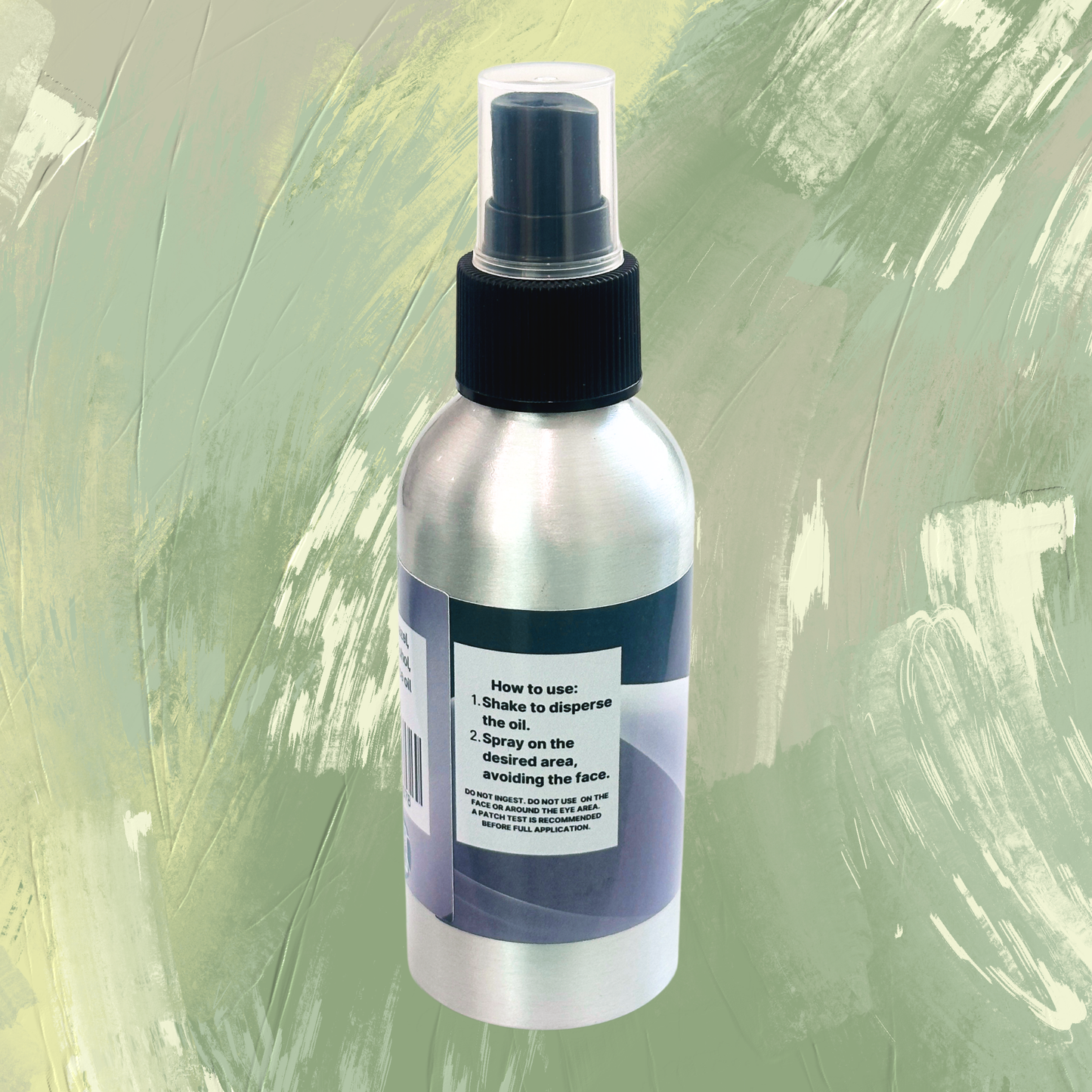 Spray bottle with label on a green textured background