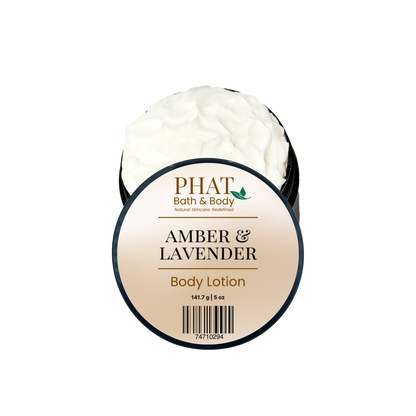 Open black jar of Amber & Lavender Body Lotion with Phat Bath & Body labeled lid and rich white lotion.
