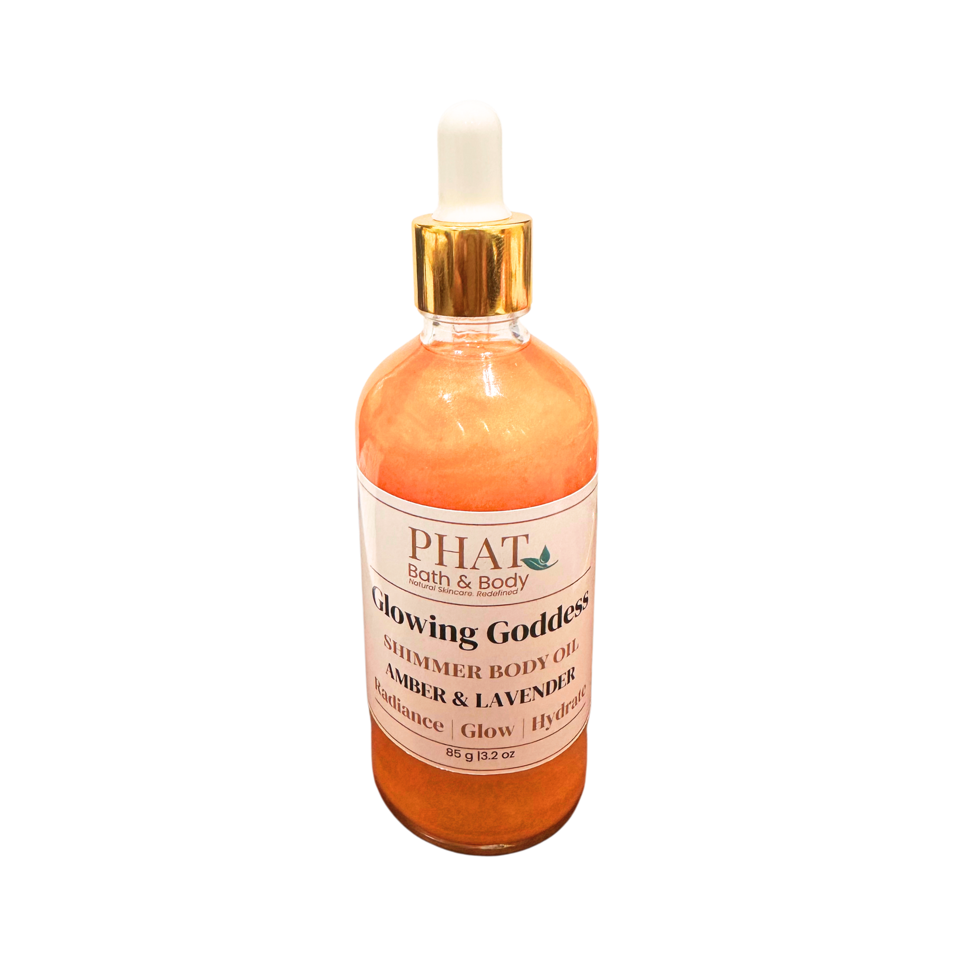 Bottle of 'Glowing Goddess' shimmer body oil by PHAT Bath & Body on a white background