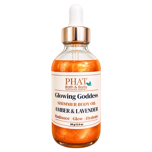 Phat Bath & Body Glowing Goddess Shimmer Body Oil in Amber & Lavender, 3.5 oz glass dropper bottle with luminous orange-gold shimmer.