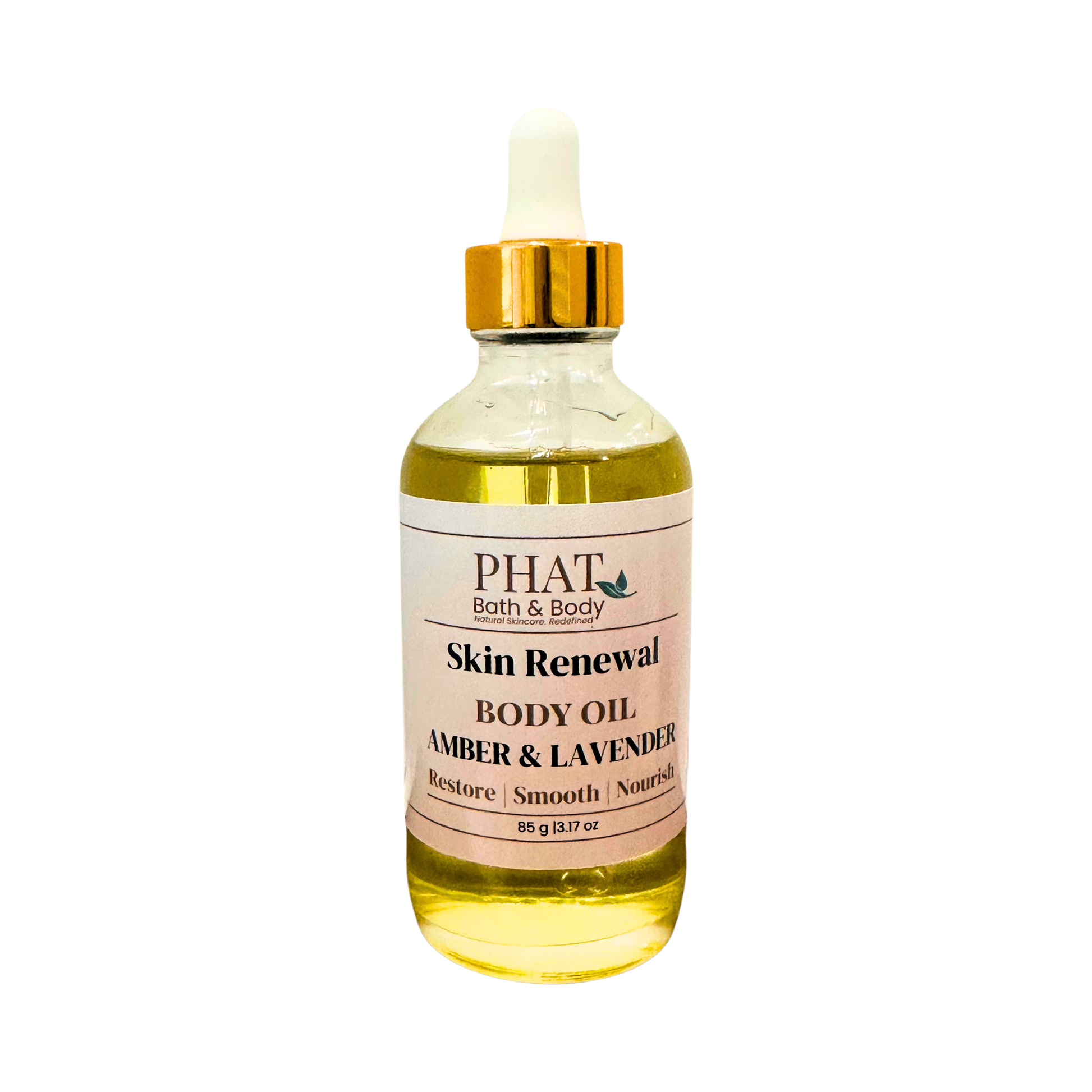 A bottle of PHAT Bath & Body Skin Renewal Body Oil in the Amber & Lavender scent, featuring a clear glass bottle filled with golden-yellow oil, a white label, and a gold cap with a white dropper, set against a plain white background.