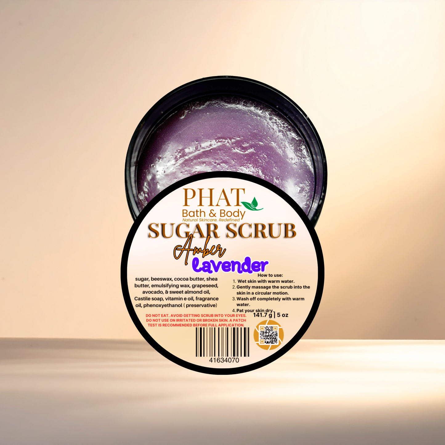 Amber Lavender sugar scrub with Phat Bath & Body branding on a beige background