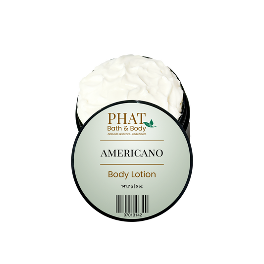 An open round tub of PHAT Bath & Body 'Americano' body lotion, showing the white cream inside, with a light green and black label on a white background.