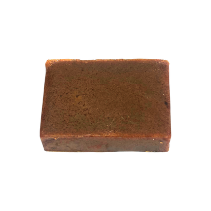 Rectangular brown bar of soap on a white background