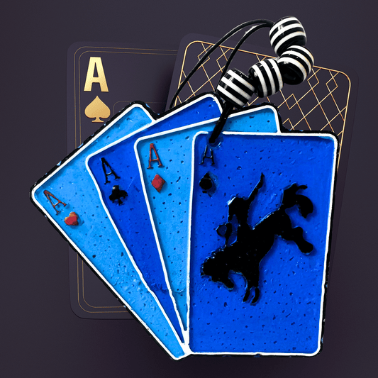 Blue playing cards car freshie with black silhouette design on a dark background