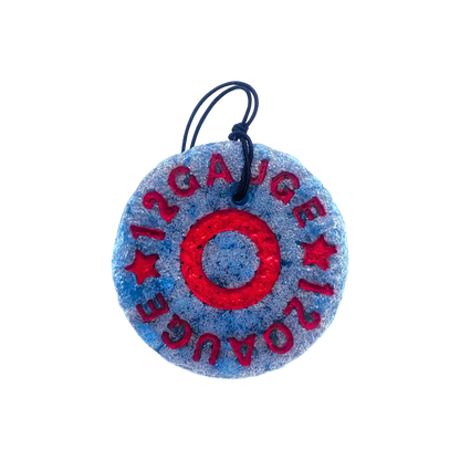 Round blue and red freshie with '12 Gauge' text on a white background