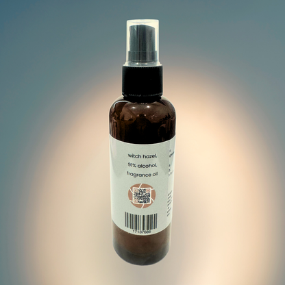 Brown spray bottle with a label on a gradient background