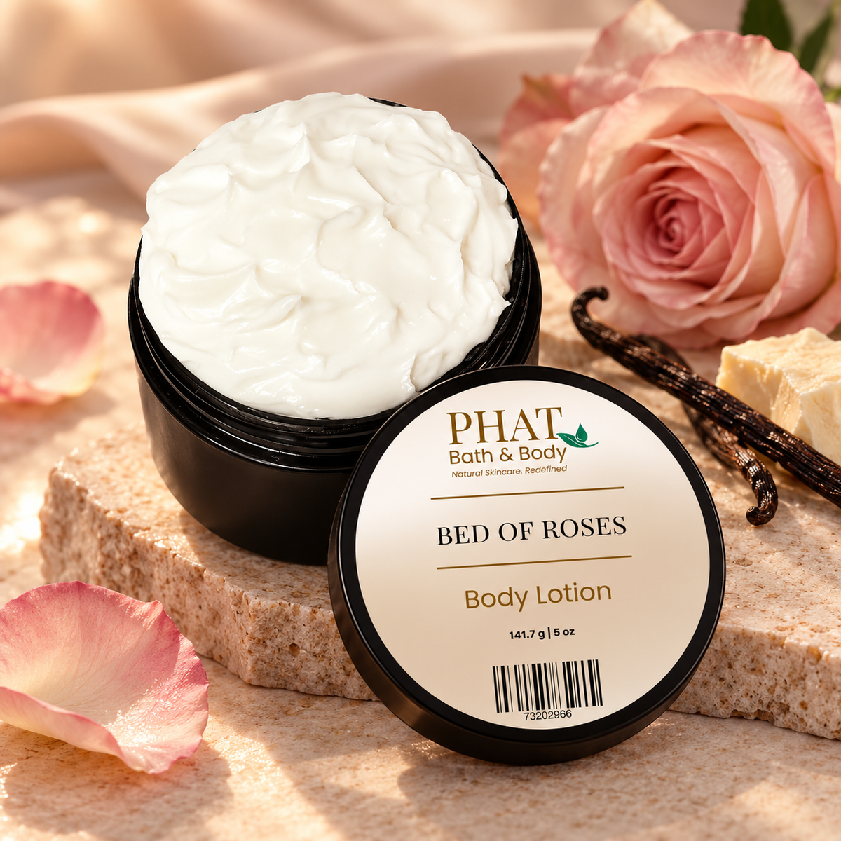 Bed of Roses Body Lotion with labeled lid displayed among blush roses, vanilla, rose petals, and warm natural stone.
