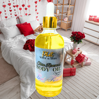 Bottle of Phat Bath & Body body oil in a bedroom setting with decorative elements.