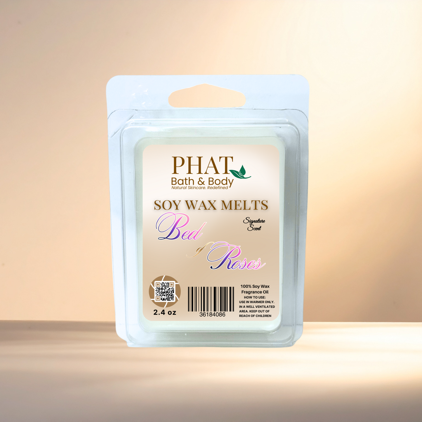 Packaged soy wax melt from Phat Bath & Body on a gradient background