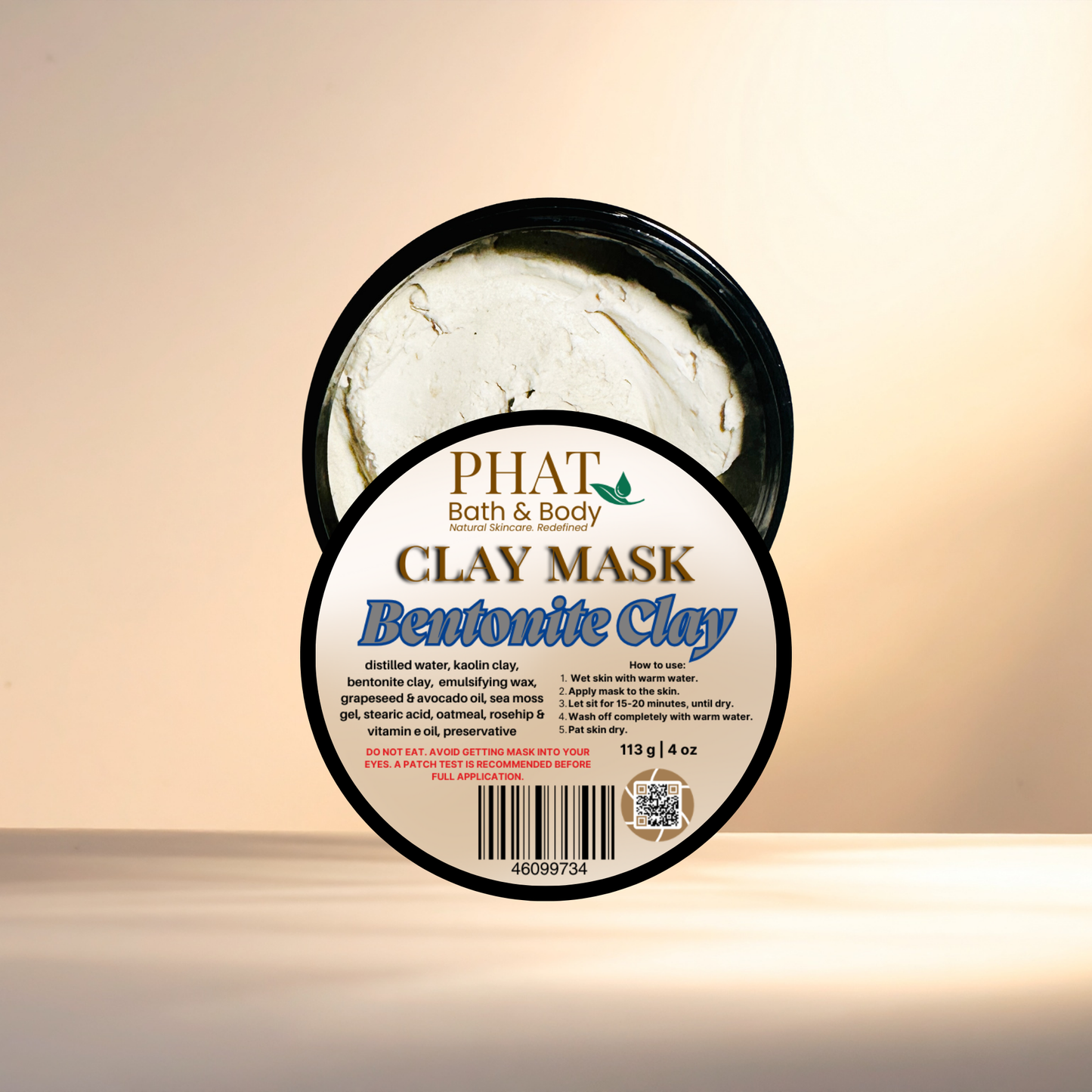 Bentonite clay mask in a container with 'Phat Bath & Body' branding on a beige background