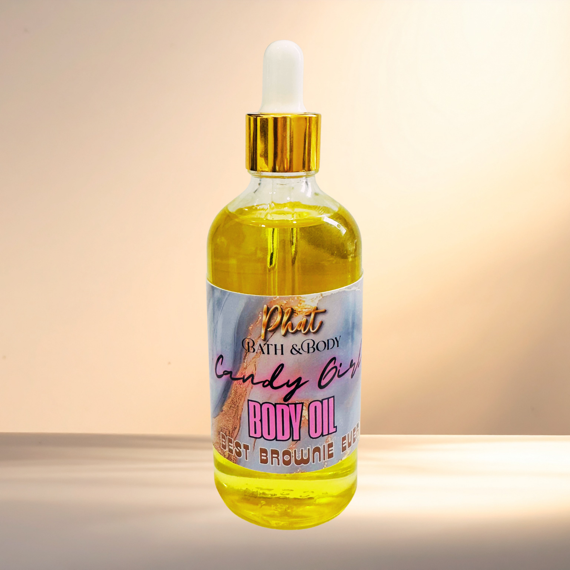 Bottle of body oil with a dropper on a gradient background
