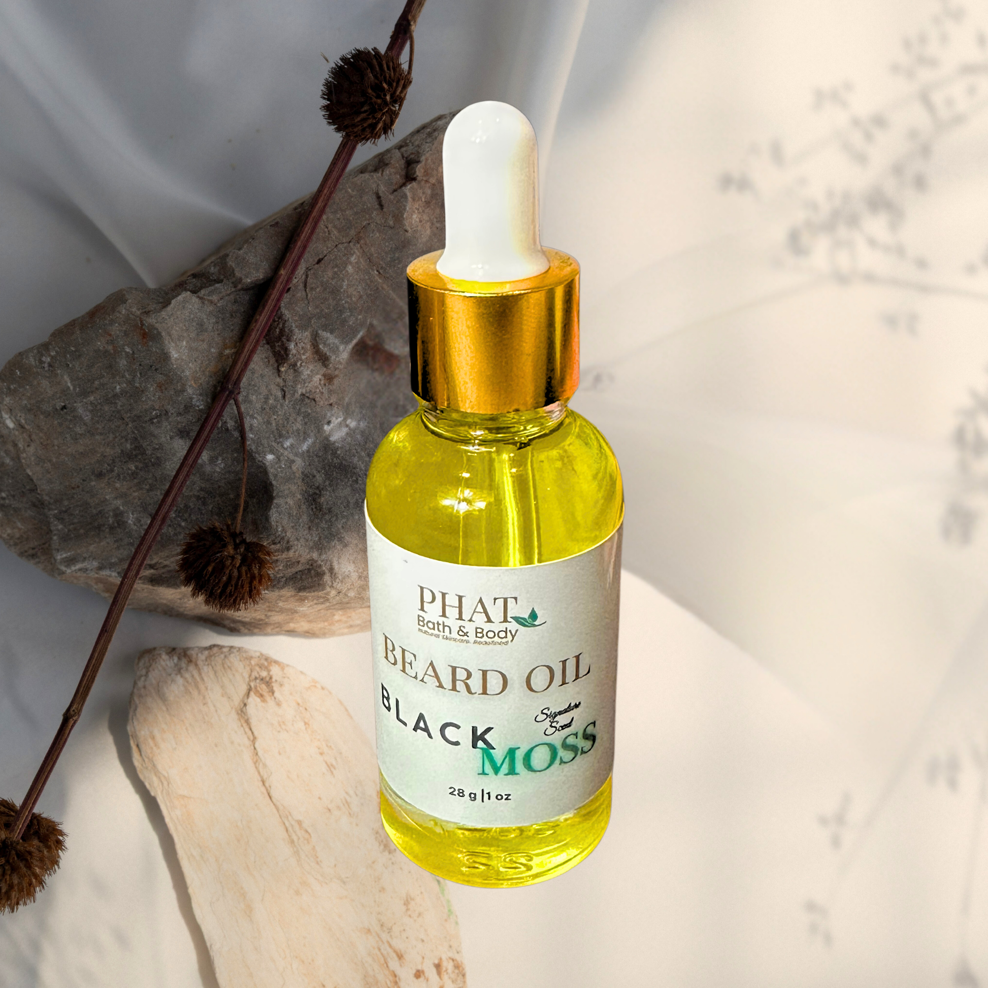 Bottle of Phat Bath & Body Black Moss Beard Oil on a neutral background