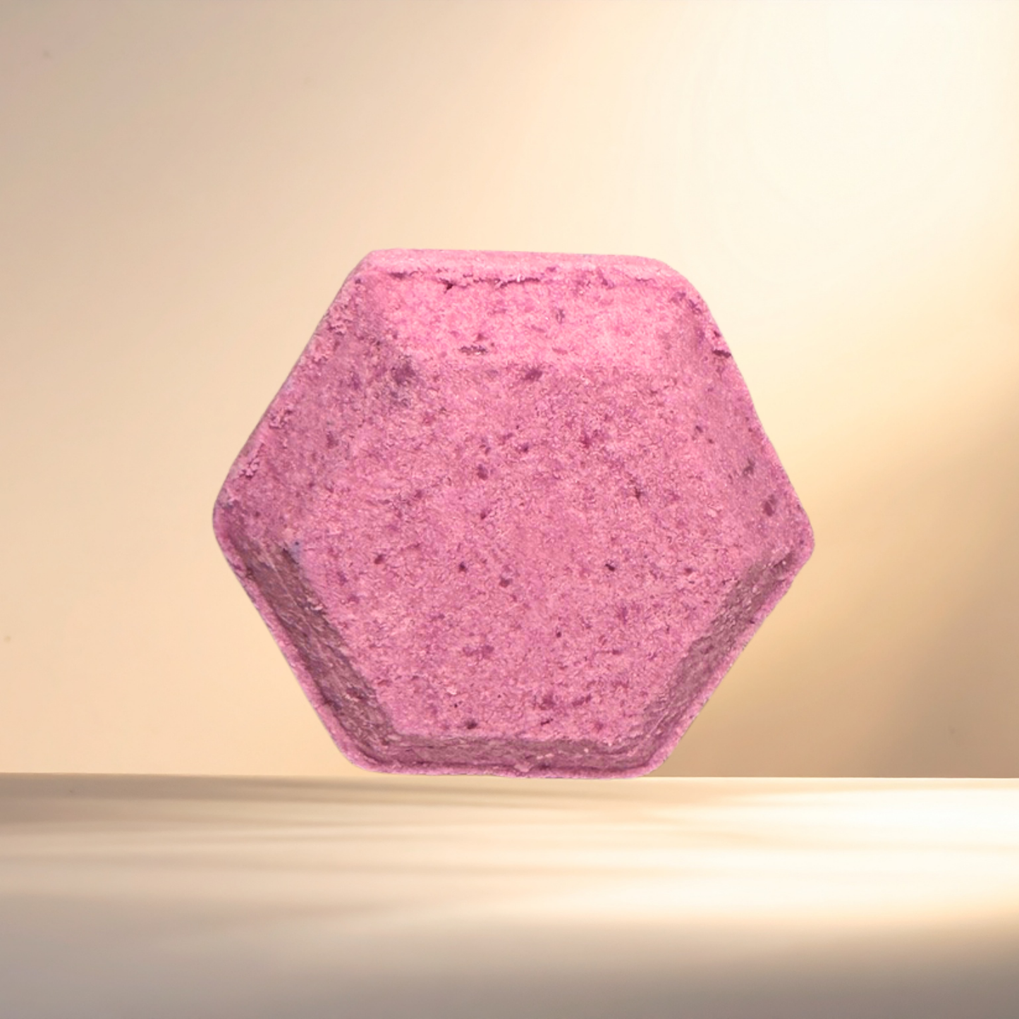 Hexagonal pink steamer on a beige background