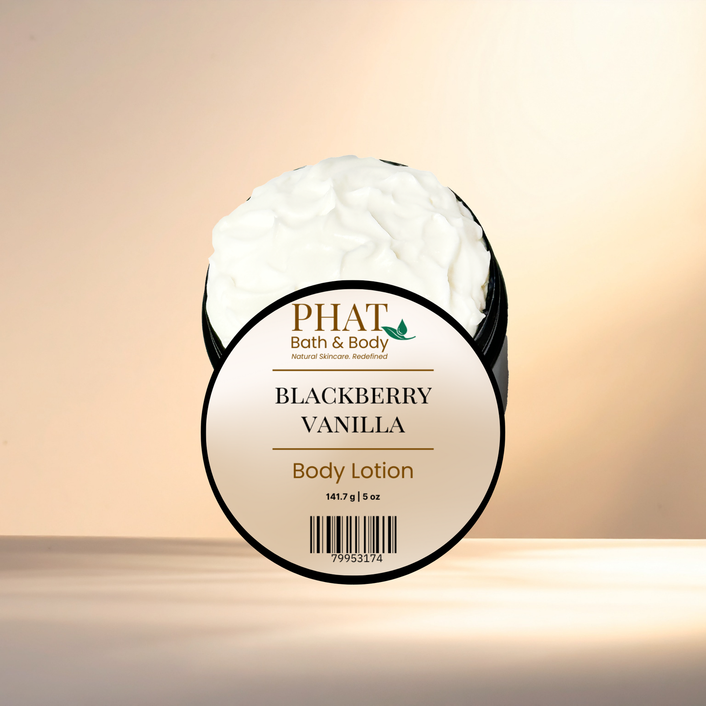 An open round jar of PHAT Bath & Body Blackberry Vanilla Body Lotion, showing the white whipped lotion inside, set against a warm beige gradient background.