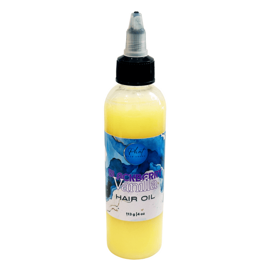 Bottle of Blackberry Vanilla hair oil on a white background
