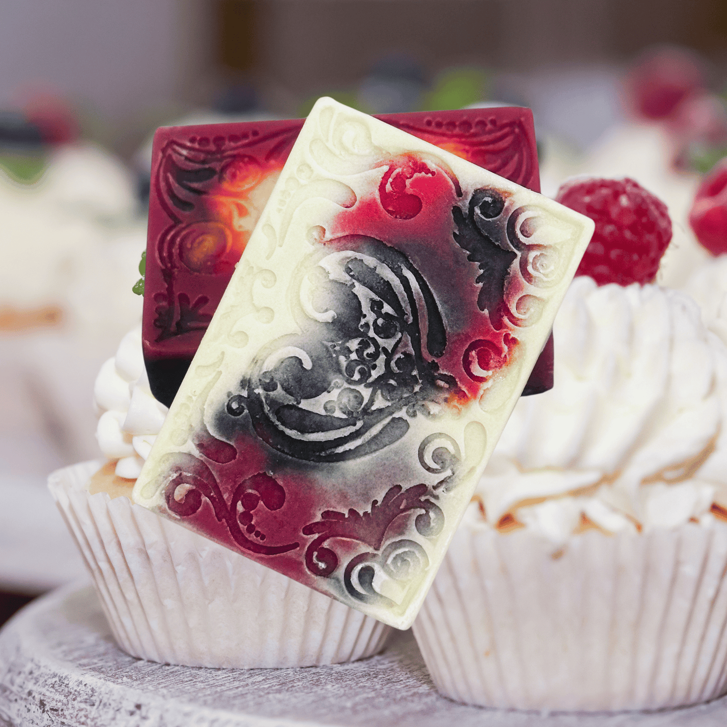 Decorative soap with intricate design on a cupcake