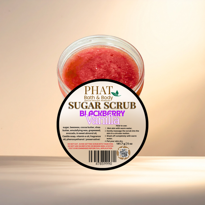 Jar of sugar scrub with a visible label on a beige background