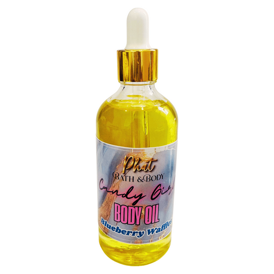 Bottle of body oil with a dropper labeled 'Phat Bath & Body' on a white background