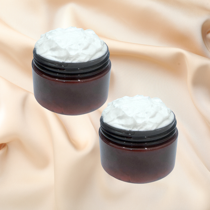 Two brown jars filled with white cream on a beige fabric background