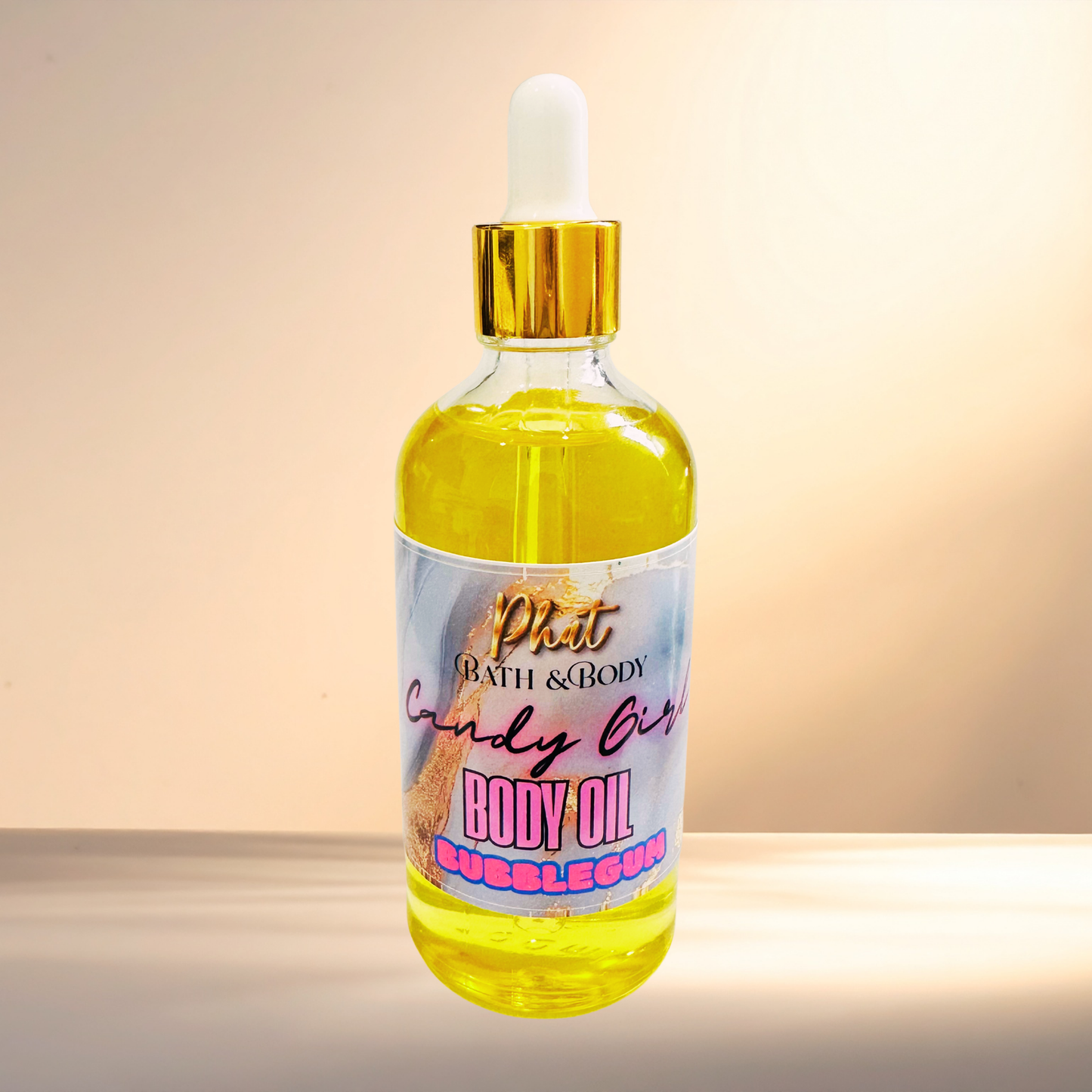 Bottle of body oil with a colorful label on a gradient background