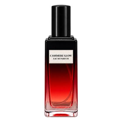 Phat Bath & Body Cashmere Glow Eau de Parfum in a tall clear glass bottle with black cap, warm tan label, and rich red-toned fragrance, shown as the main product image.