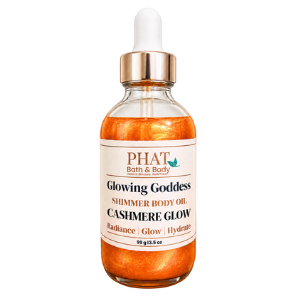 Phat Bath & Body Glowing Goddess Shimmer Body Oil in Cashmere Glow, 3.5 oz glass dropper bottle with radiant golden shimmer oil.