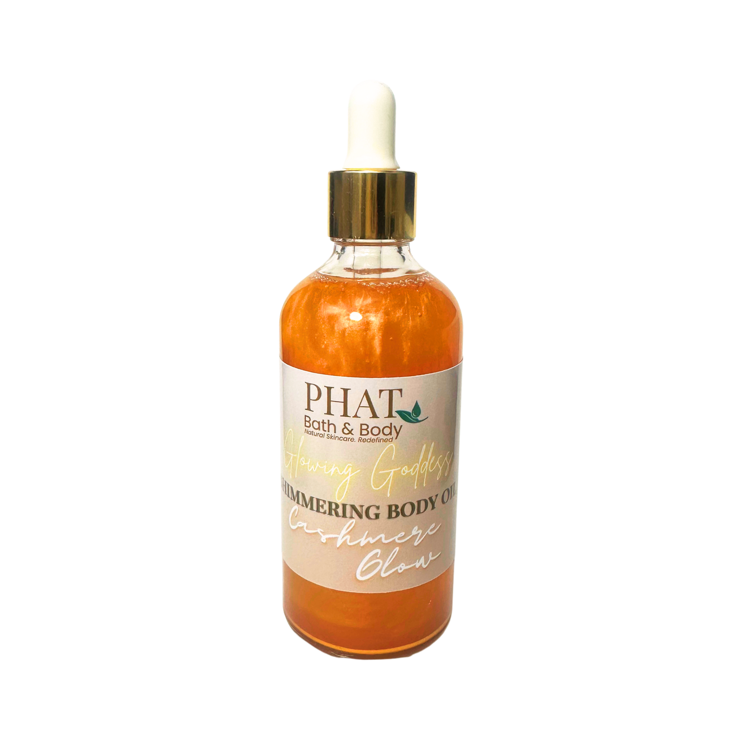 Gold bottle of 'Glowing' shimmering body oil by Phat Bath & Body on a white background