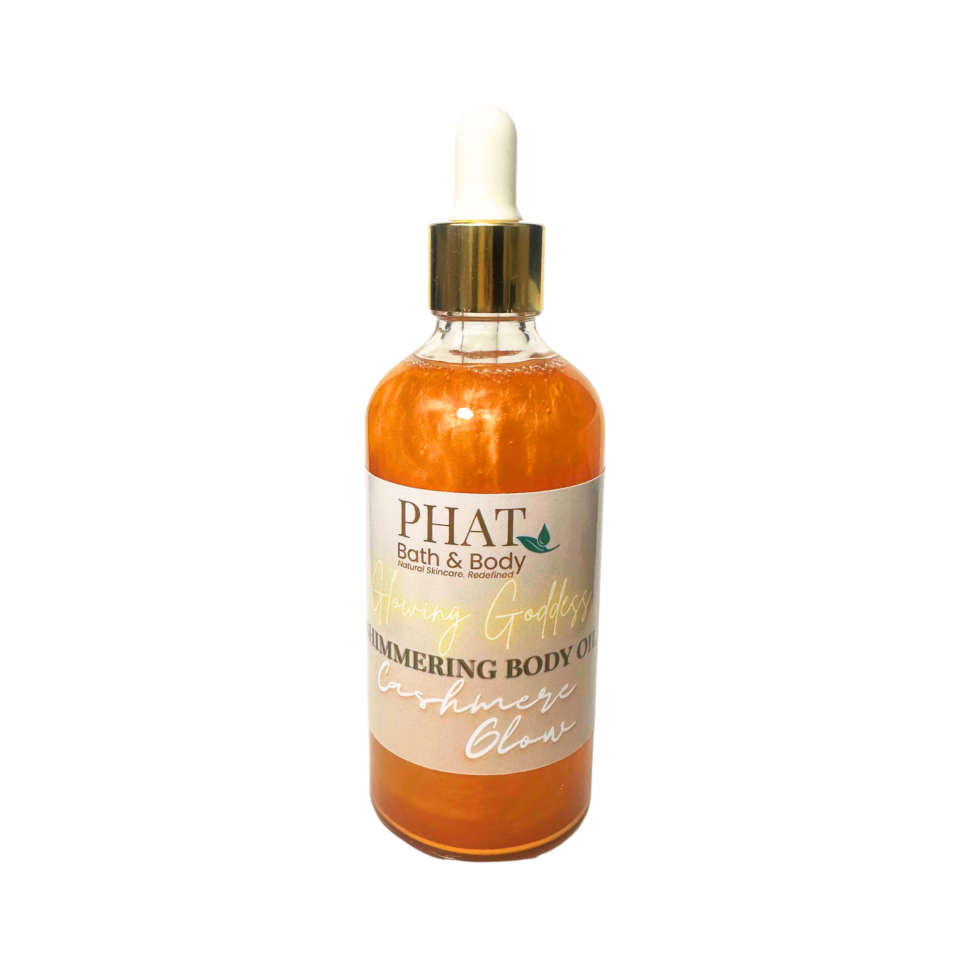 Gold bottle of 'Glowing' shimmering body oil by Phat Bath & Body on a white background