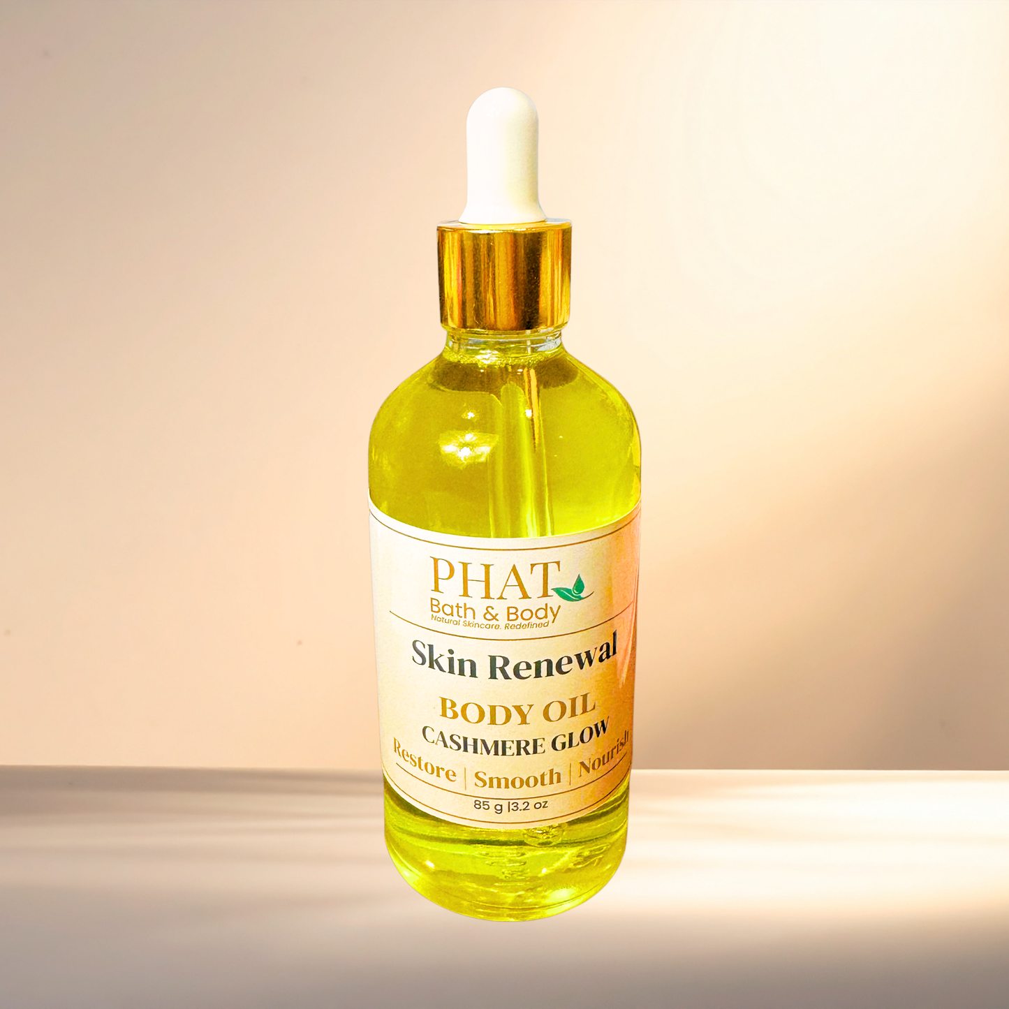 Bottle of PHAT Bath & Body Skin Renewal Body Oil on a gradient background