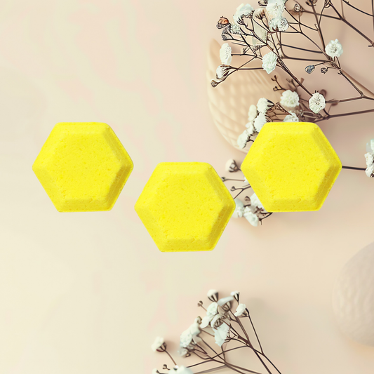 Three yellow hexagonal steamers on a light pink background with white flowers.