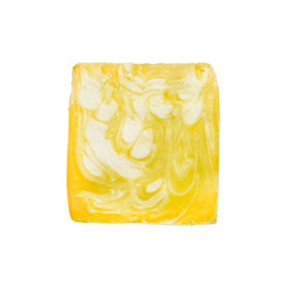 Marbled yellow and white soap bar on a white background