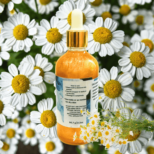 Chamomile bottle with dropper surrounded by white flowers with yellow centers