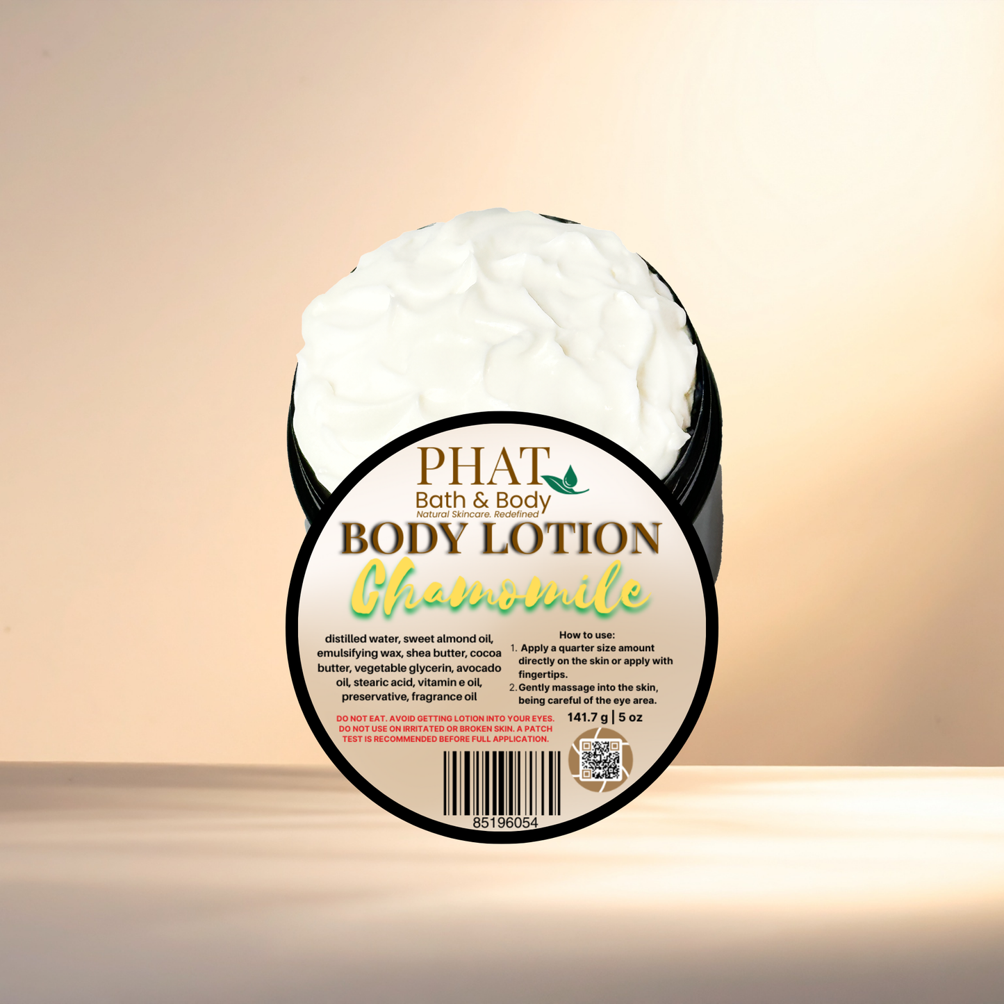 Body lotion container with 'Phat Bath & Body' label on a beige background